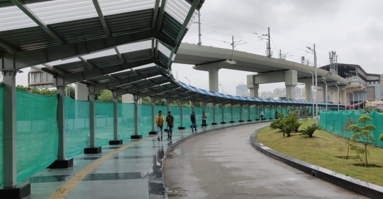 Walkway connecting aqua, blue lines open for public use